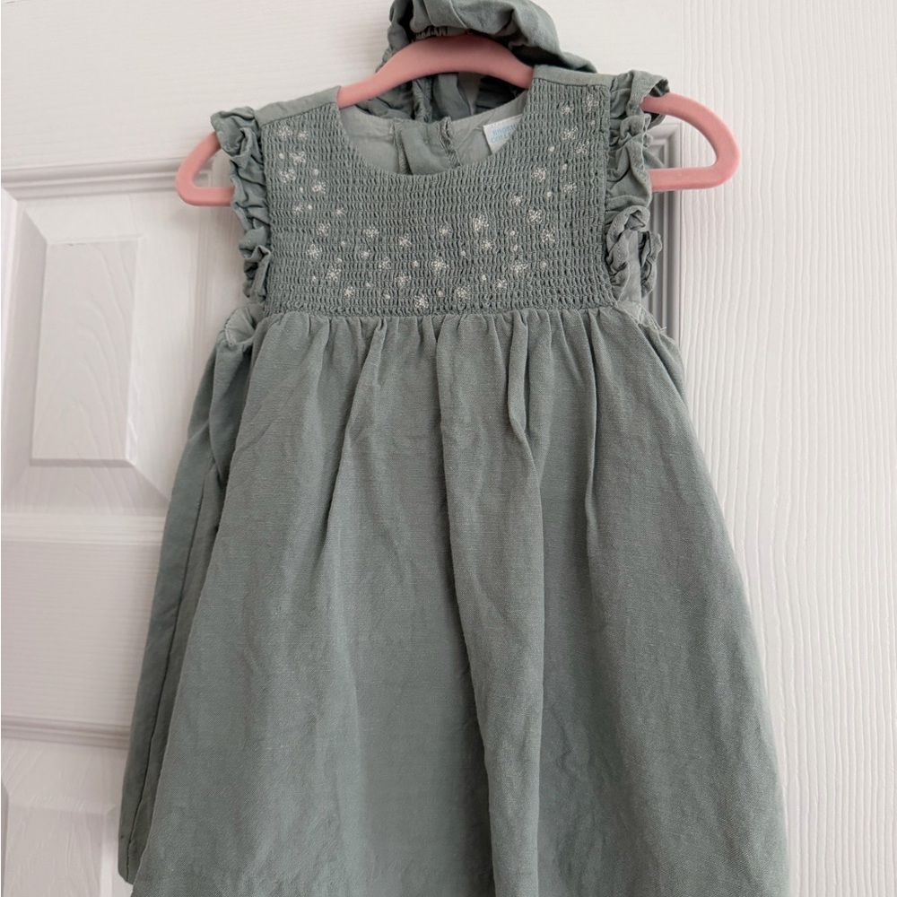 Edgehill Collection smocked baby dress in a sage green color. 9M